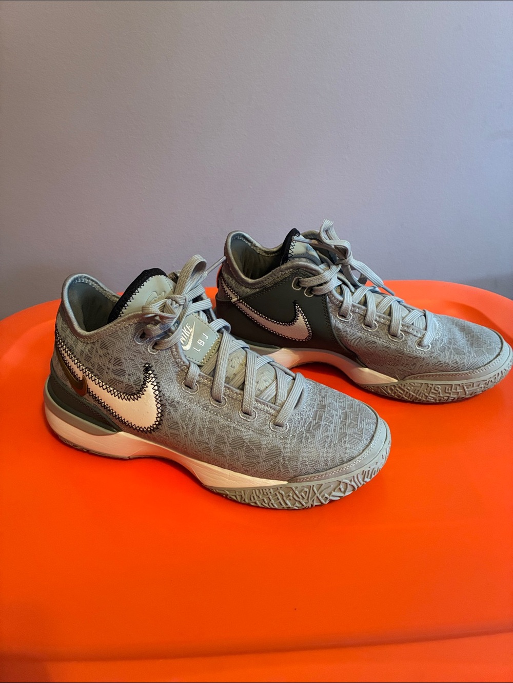 Women’s Nike Grey Basketball Sneakers with White Swoosh